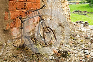 Rusty bicycle in Oradour sur Glane photo