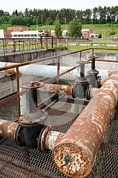 Rusty big taps and pipes. water treatment plant