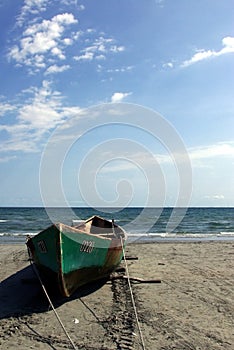 A Rusty boat ashore