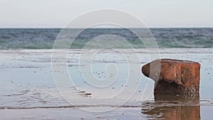 Rusty bollard on pier