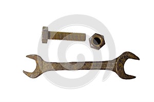 Rusty bolt, nut and spanner over is