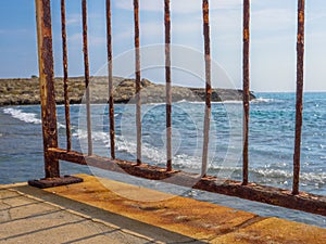 Rusty bridge fence and beautiful seaview in Cyprus