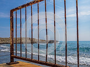 Rusty bridge fence and beautiful seaview in Cyprus