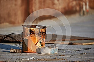 Rusty bucket remains at a construction site