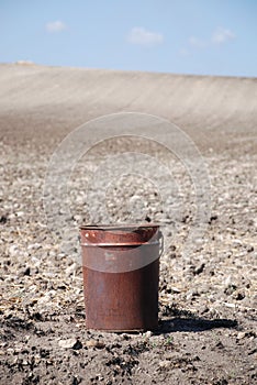 Rusty Bucket on Soil