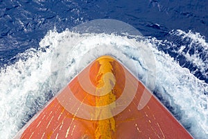 Rusty bulb in the blue ocean.