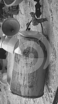 A rusty can hanging on the wall. Zichron Yakov. Israel
