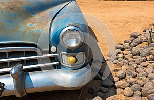 Rusty car in the car park at Solitaire, Sesriem, Namibia