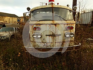 Rusty Car in Scrap Metal Yard