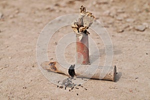 Rusty cartridge with gunpowder