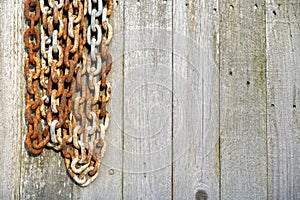 Rusty Chain and Old Weathered Fence Good Background