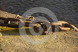 A rusty Chain on the side of the Harbour wall, Rosehaerty