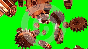 Rusty copper gears on green chroma key background.