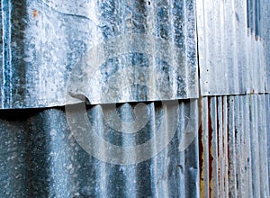 Rusty corrugate galvanized sheet iron fence