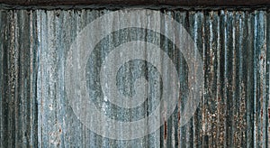 Rusty corrugated galvanized steel wall or iron metal sheet surface for texture and background