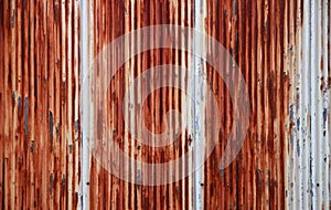 A Rusty Corrugated Metal Fence - close up - zinc