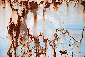 Rusty corrugated metal texture background. Rusted metal surface. Rust stains.