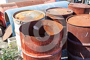 Rusty and damaged steel drums