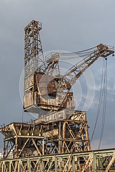A rusty, derelict crane