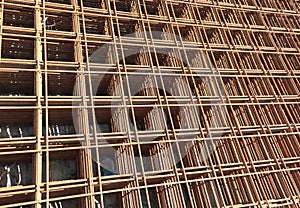 rusty electro-welded net on the building site to favor the pouri