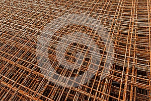Rusty fittings. rusty construction metal mesh. Rusty Metal armature net for building construction. metal rebar for
