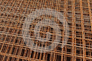 Rusty fittings. rusty construction metal mesh. Rusty Metal armature net for building construction. metal rebar for