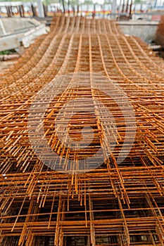 Rusty fittings. rusty construction metal mesh. Rusty Metal armature net for building construction. metal rebar for