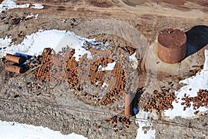 Rusty fuel drums on Arctic coast
