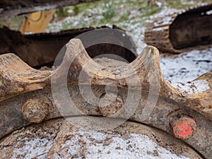 Rusty gear of tracked bulldozer. Gear metal part of the tractor