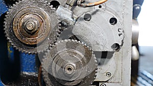 Rusty gear wheels rotating on lathe. Metalworking Milling Machine Produces Metal Detail at Factory. Operation machine