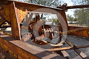 Rusty gears background, old rural agricultural machinery, rustic industrial landscape, dirty vintage gears