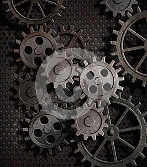 Rusty gears and cogs metal background
