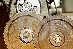 Rusty gears of the old mechanism. Vintage toning