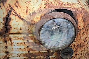 Rusty Headlight of an Old Bug