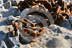 Rusty chain on beach in Dyea, Alaska