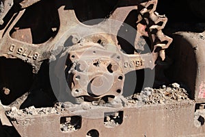 Rusty iron bulldozer wheel