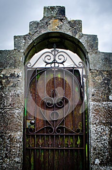 Rusty iron door in Scotland with heart pattern