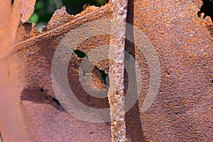 Rusty iron and pieces of rusty iron from the barrel.
