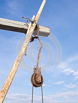 The rusty iron pulley