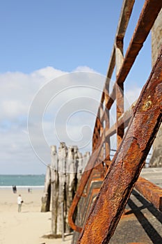 Rusty iron railings in sunshine in St Malo France