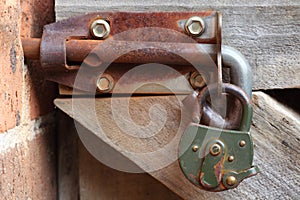 Rusty latch with padlock