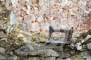 Rusty leaved sewing machine in Oradour sur Glane photo