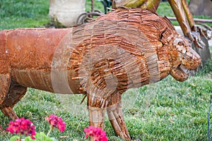 Rusty Lion Sculpture in Garden