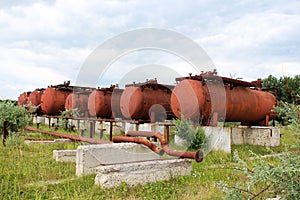 Rusty liquified gas cylinders