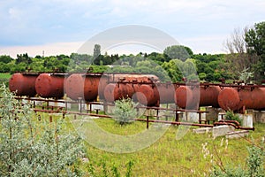 Rusty liquified gas cylinders photo