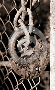 Rusty lock on chains