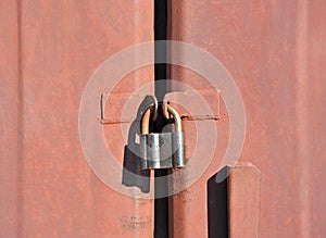 Rusty lock on garage gate