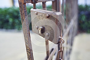 Rusty lock on iron door