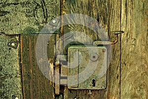 Rusty lock of one Baza 20 house Kocevski rog photo