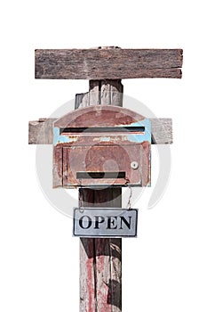 Rusty mail box hanging on old pole with blank wood and open sign isolated on white background ,clipping path